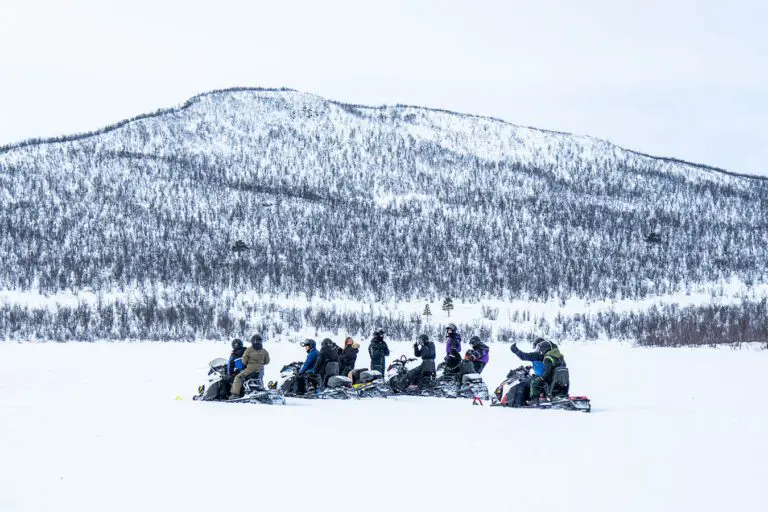 Group-of-Snowmobiles-riding-in-the-Black-Hills